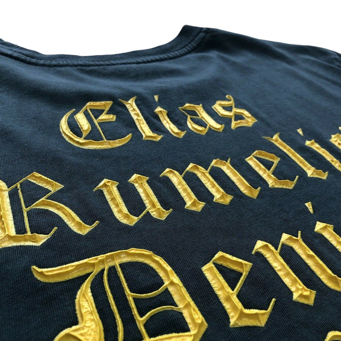 Elias Rumelis T-Shirt Men’s Medium Navy Blue With Raised Yellow Print